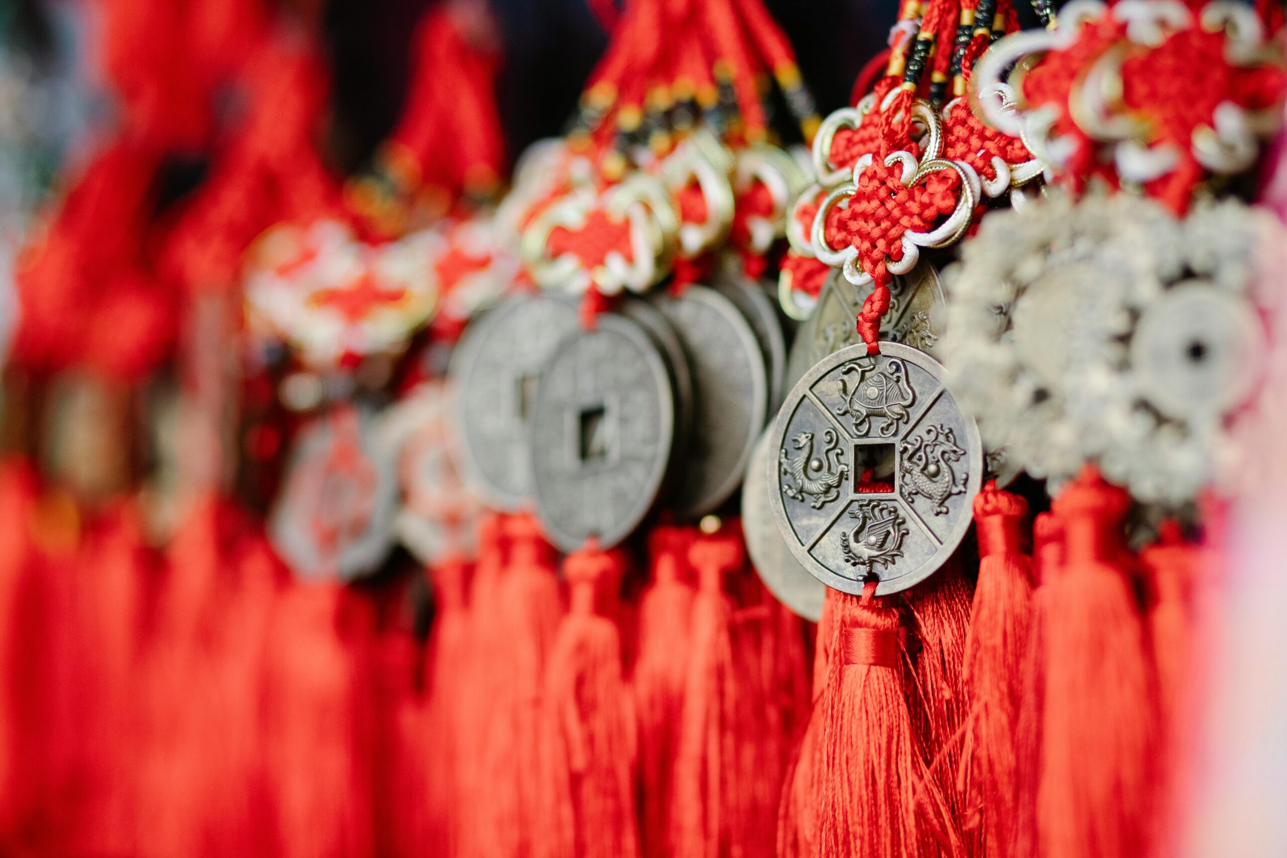 Chinese knot lucky coins with red thread to celebrate New Year