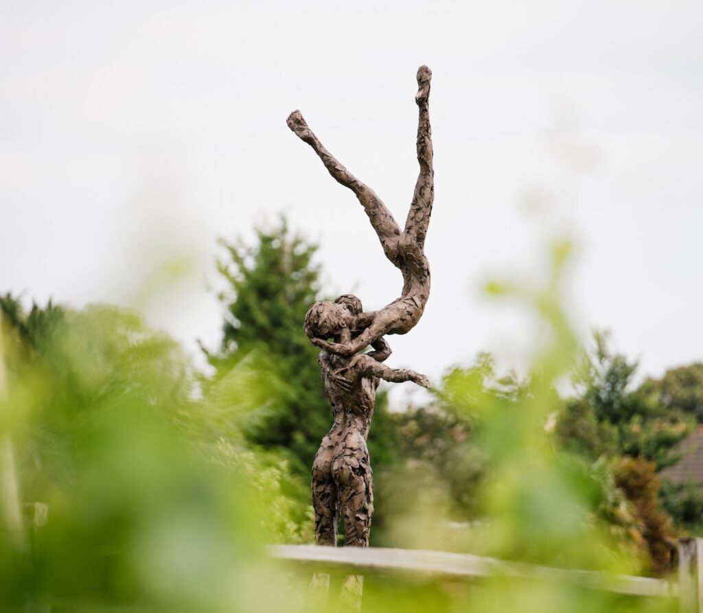 Carol Peace sculpture in the ground at Lympstone Manor