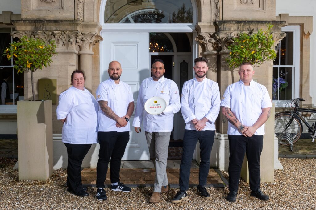 Michael Caines with Chef team in front of the Manor House.