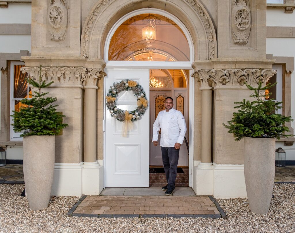 Michael Caines greeting guests at Lympstone Manor Hotel