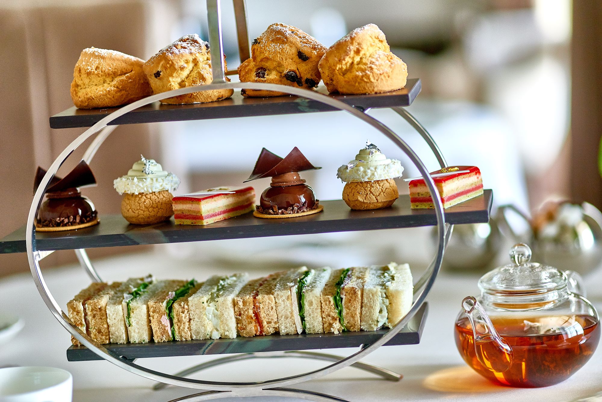 Lympstone Manor Hotel Afternoon Tea with sandwiches, cakes, scones and teapot
