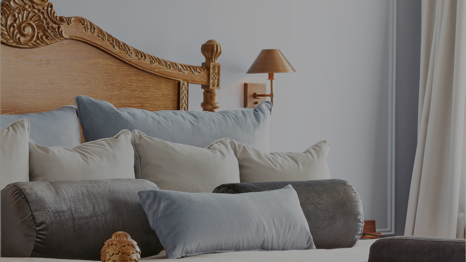 Lympstone Manor Suite showing the bed, pillows and cushions