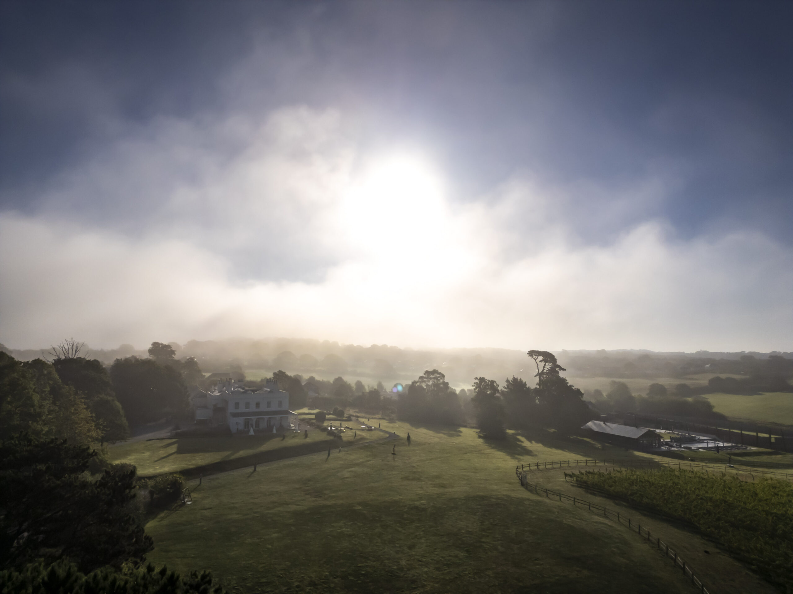 Misty morning view of Lympstone Manor Estate
