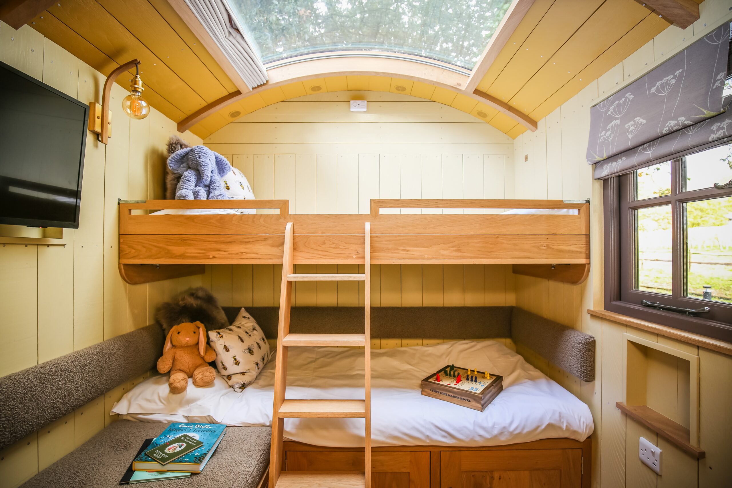 Bunk beds in family friendly shepherd huts at Lympstone Manor Hotel
