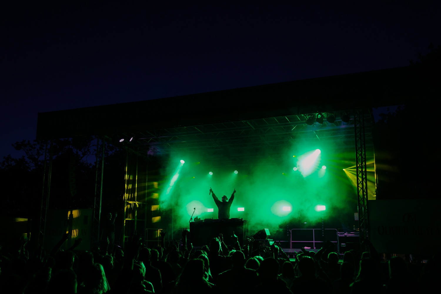 Party in the Paddock DJ set with green stage lights