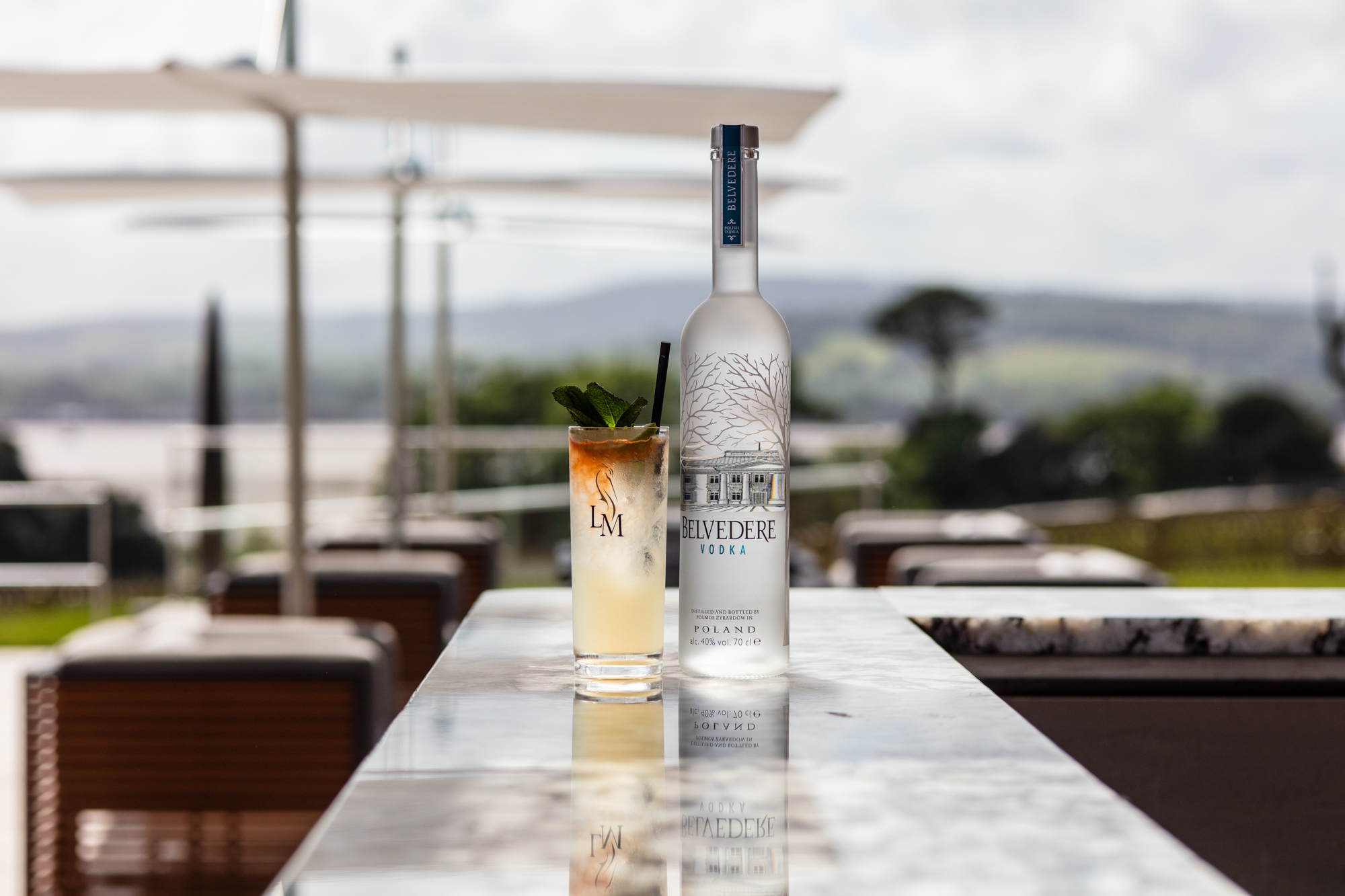 Belvedere Vodka bottle with cocktail at the Pool House